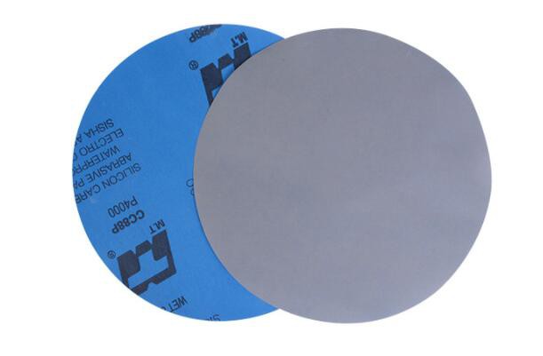 Adhesive backed sanding discs